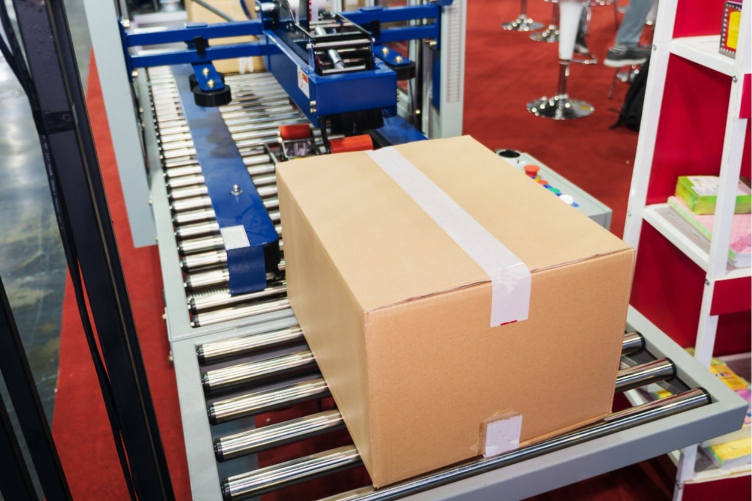Taped carton on conveyor